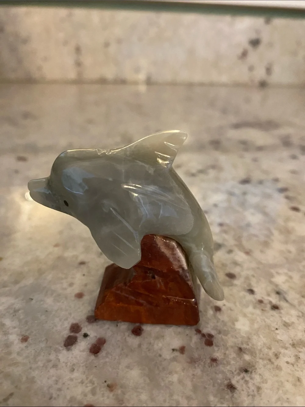 Stone dolphin figure. NWT about 1.5x2.5 in. Summer